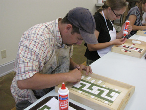 Students working on the introduction tray project